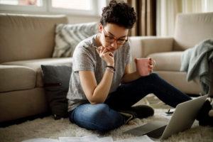 Woman reading a piece of paper