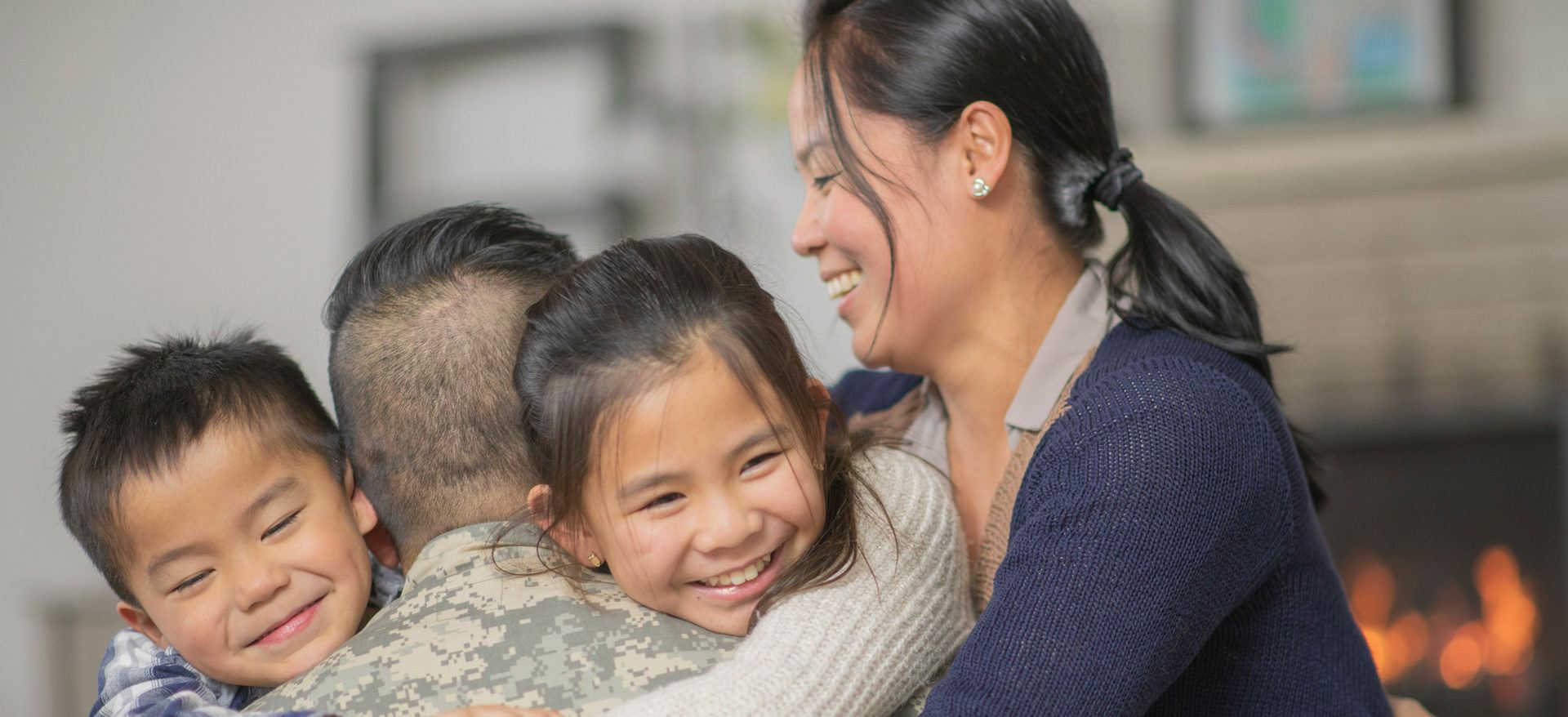 Military family hugging