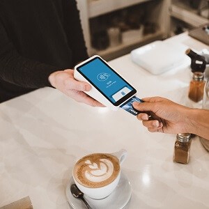 Person paying for purchase with credit card