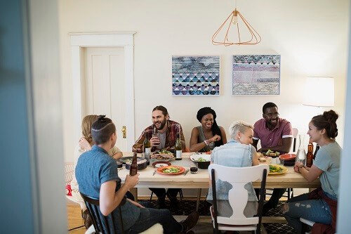 Friends gathering at a table