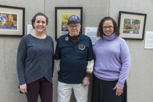 Service CU staff members Jaime Yates and Aimee Sundstrom with World War II Veteran Ray Goulet