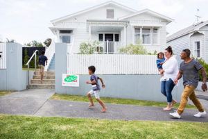 Family running into home together