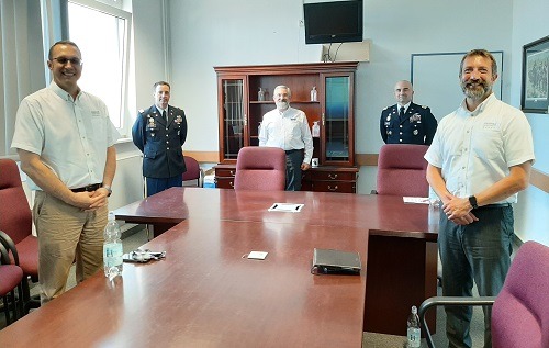 Service CU staff pose with Army representatives