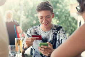 Teenage Boy With Credit Card