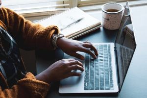 Person typing on a laptop