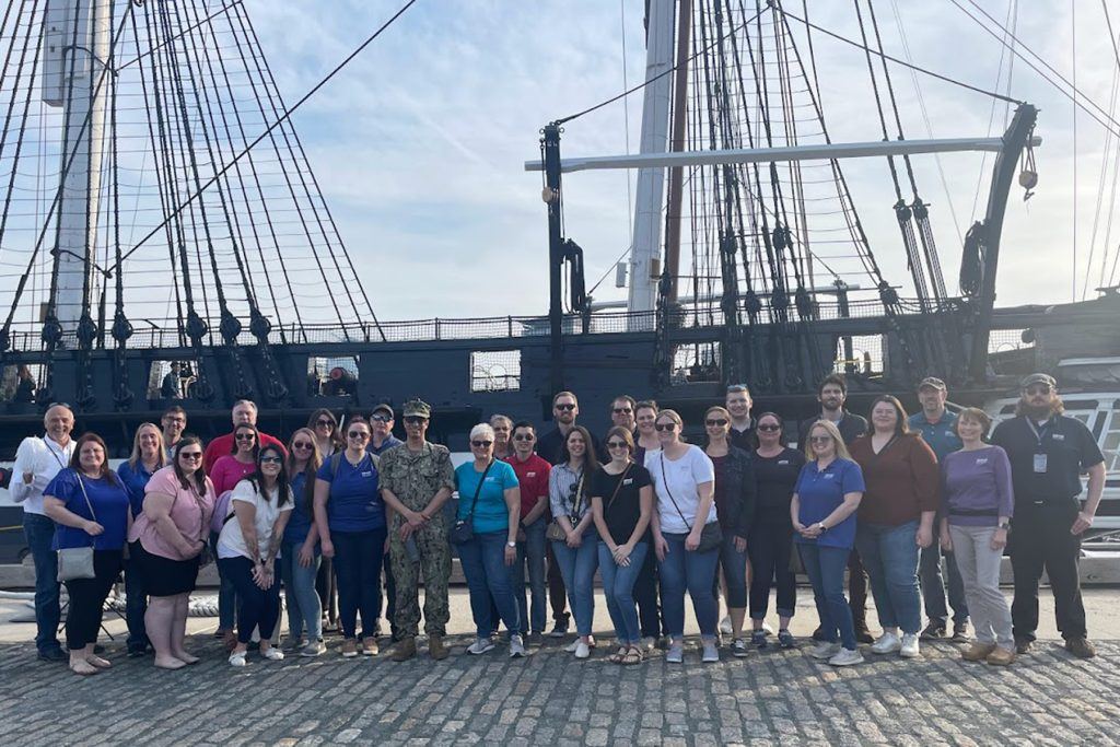 More than 30 Service CU volunteers helped pack care packages at the USS Constitution Museum.