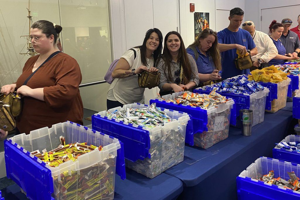 Service CU volunteers packed care packages with snacks and toiletries to provide service members a taste of home.
