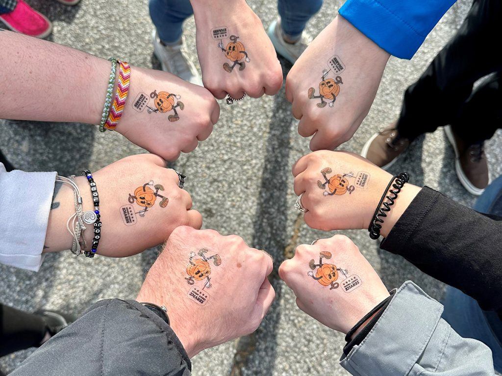 Service CU volunteers handed out lots of giveaways at this year's Pumpkin Festival, including custom pumpkin temporary tattoos.