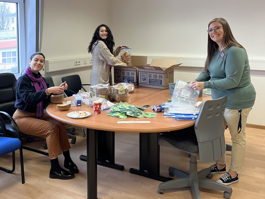 Service CU volunteers helped pack care packages with snacks, games and activities.