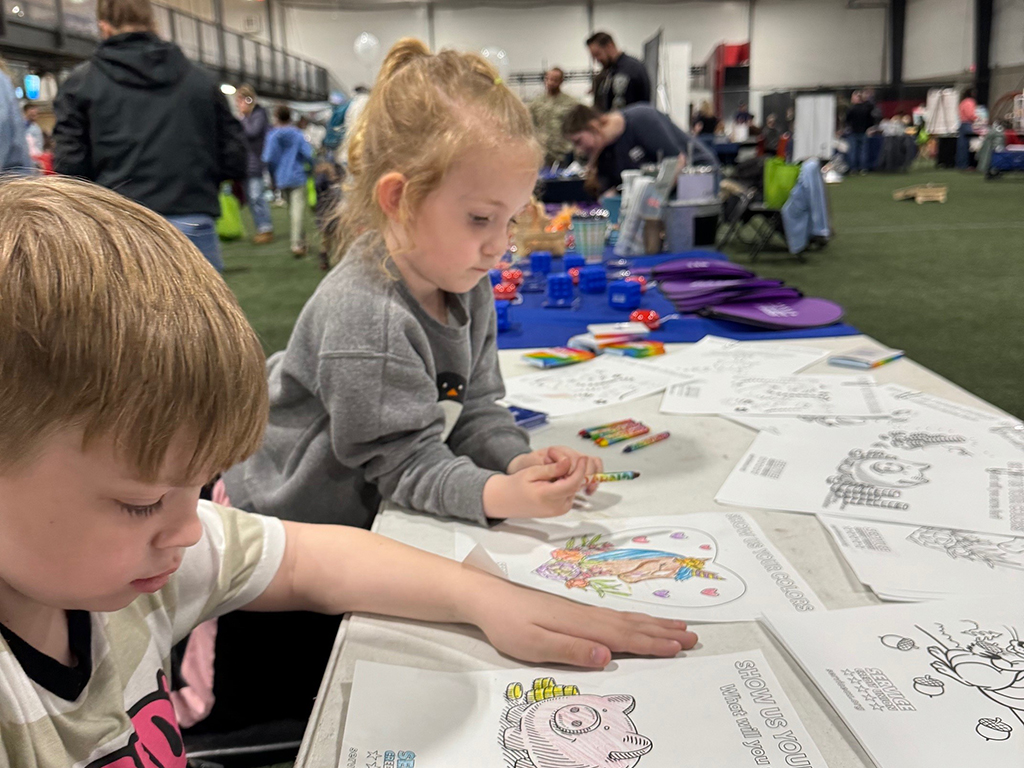 In addition to sponsoring KidsFest, Service CU hosted an activity table with coloring pages.