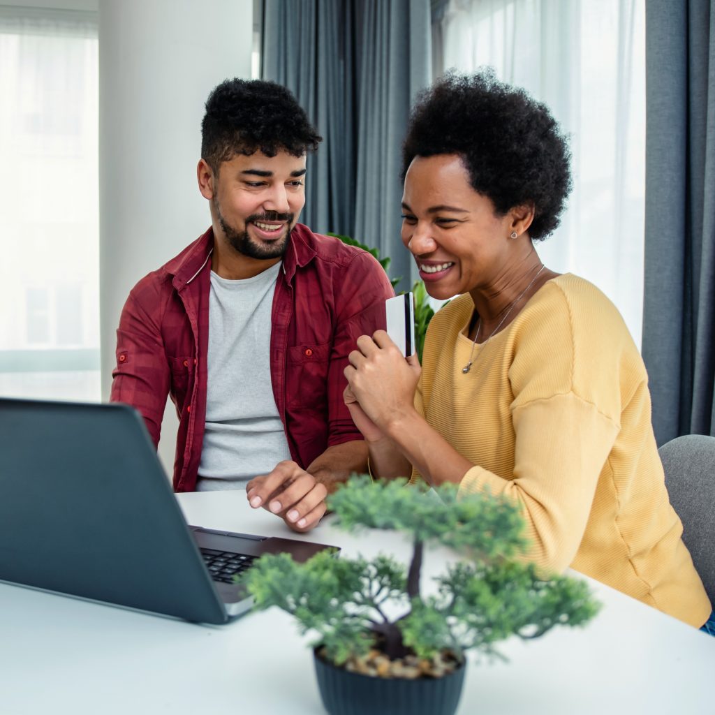 Couple managing their finances online