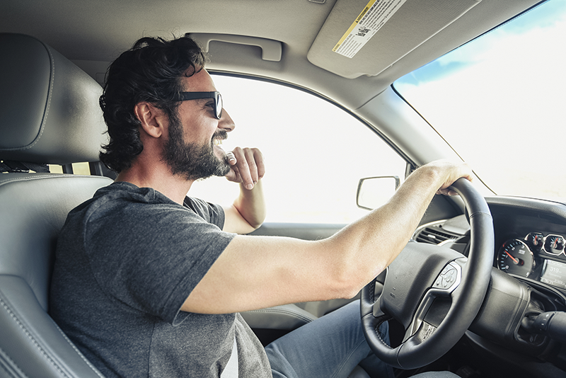 Man-Driving-New-Car