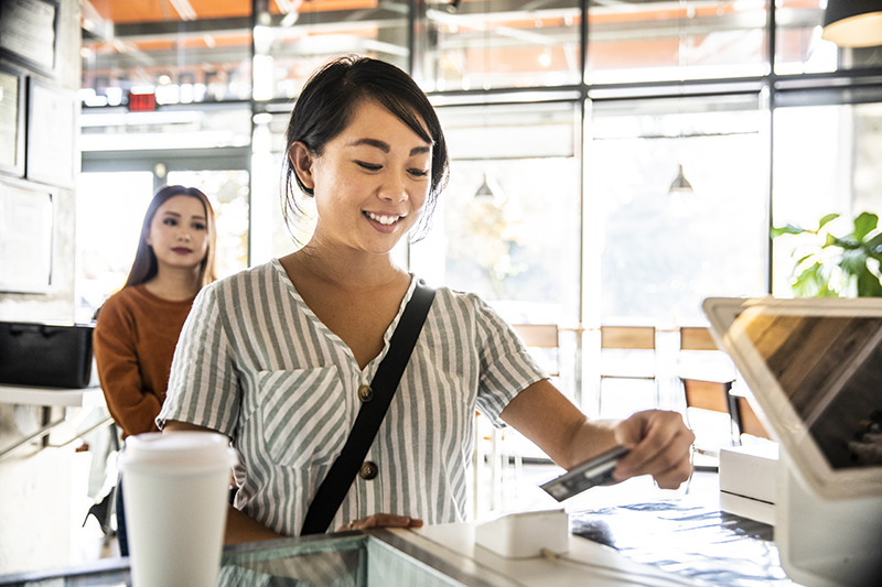 Woman-Paying-at-Store