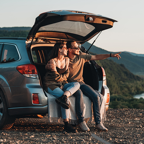 Couple sitting in their car