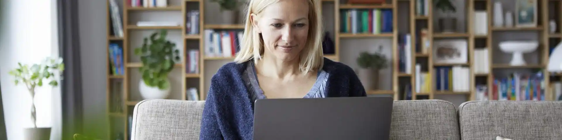 woman looking at her laptop