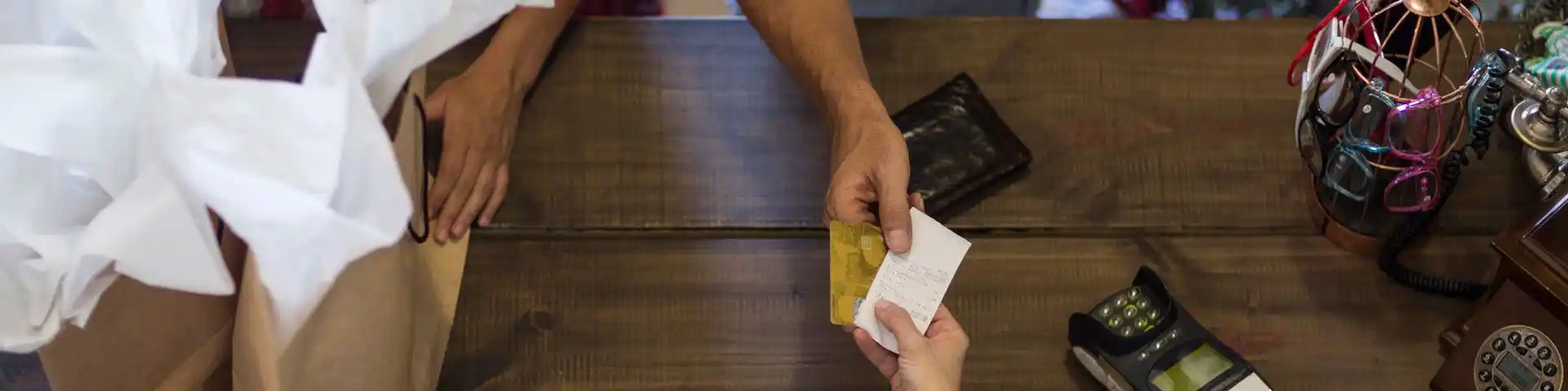 someone paying for takeout with a card