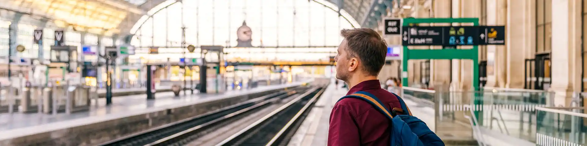 man waiting for a train