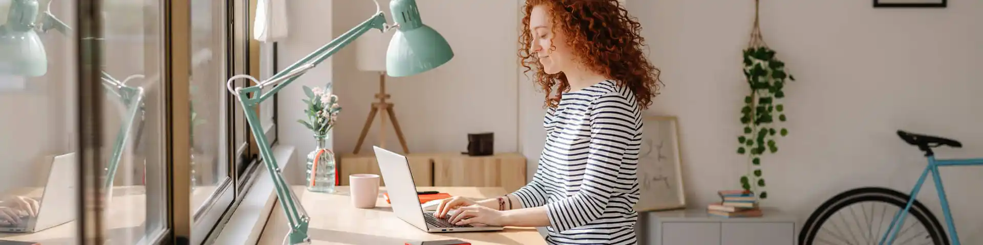 woman accessing her laptop