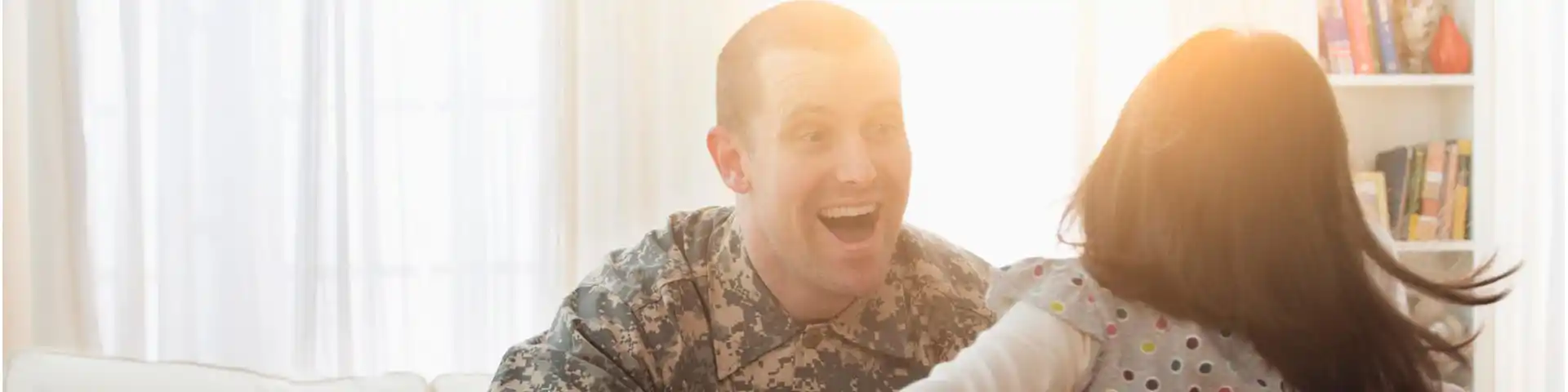 father veteran coming home to an excited child