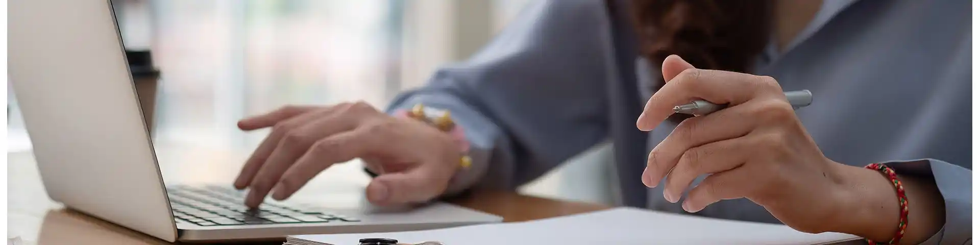 business woman accessing her laptop