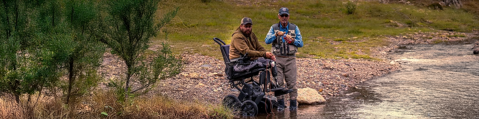 man in a wheelchair fishing