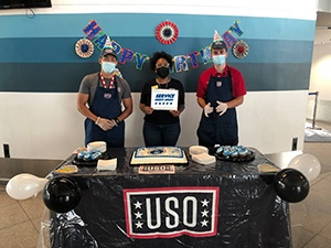 group-at-table-SCU-sign-1